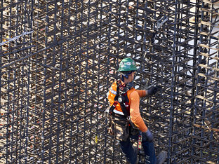 Construction Team Working on Development of The Grand