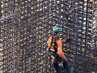 Construction Team Working on Development of The Grand