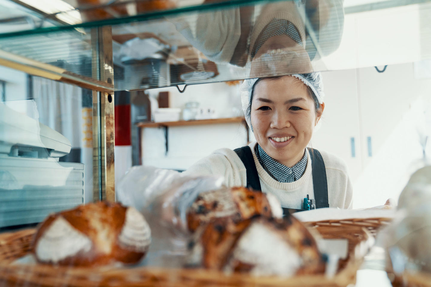 Pastry Chef Placing Baked Goods on Rack