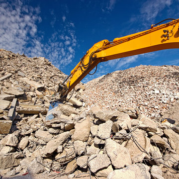 Construction Equipment, Digging Through Rocks